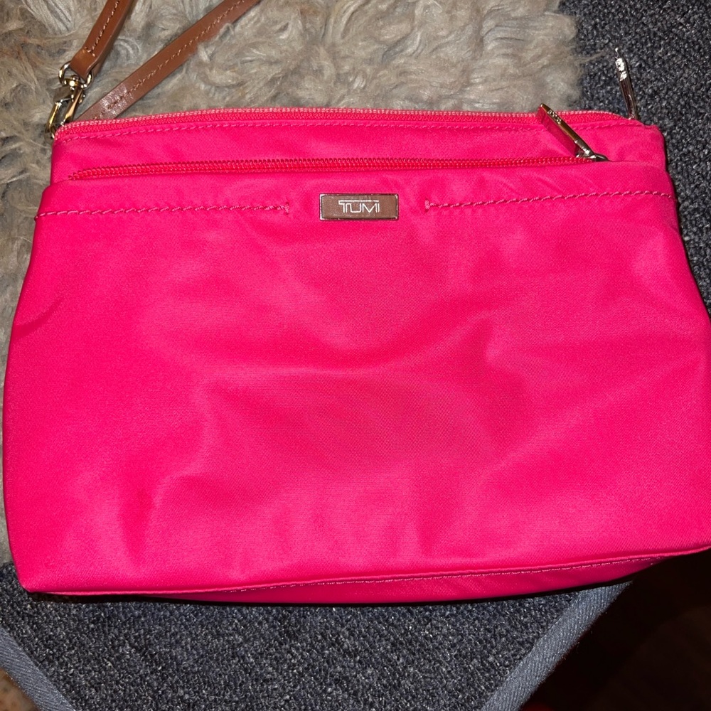 Tumi Pink Clutch with Gold Accents
